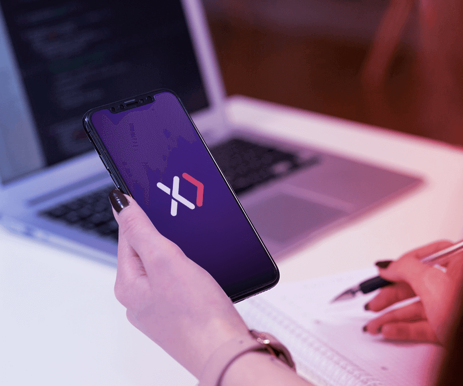 Launching apps has never been easier Photograph of a woman looking at her phone with the Expresia's logo on her homescreen