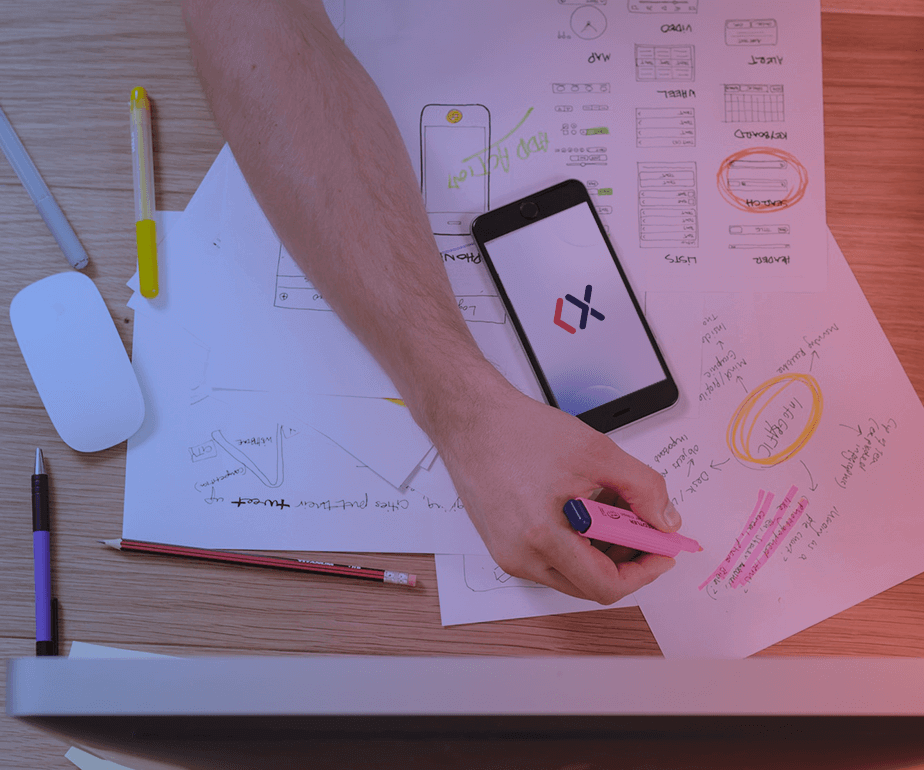 Product control that makes sense for your business Photograph of a hand with a marker writing over some papers on a table